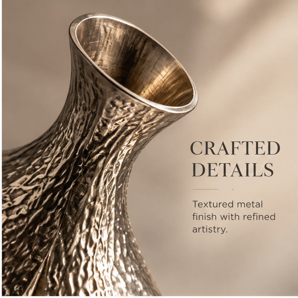 Ring-shaped metal vase styled with an airy branch arrangement on a console