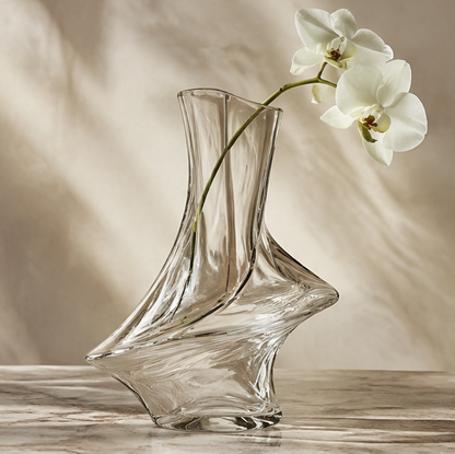 SPIRAVE clear asymmetric twist glass vase styled with a white orchid stem, without text overlay