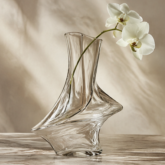 SPIRAVE clear asymmetric twist glass vase styled with a white orchid stem, without text overlay